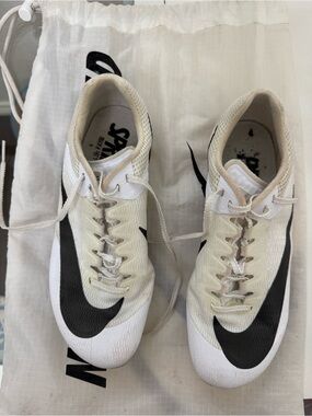 Nike White/Cream track spikes with Black Swoosh